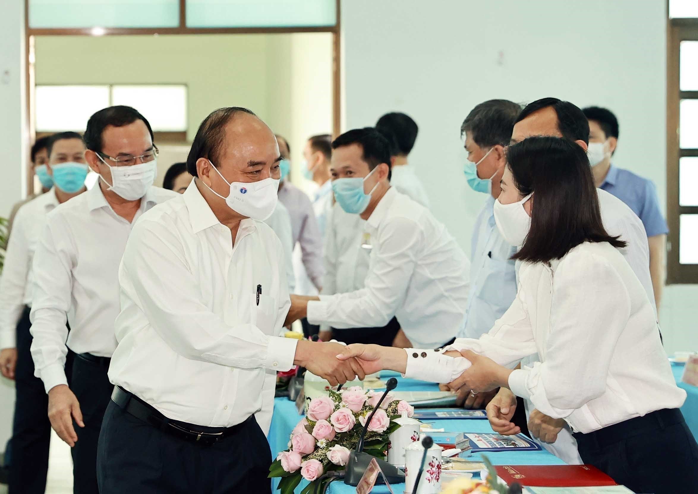 State President holds working session with Cu Chi, Hoc Mon districts in HCM City hinh anh 1