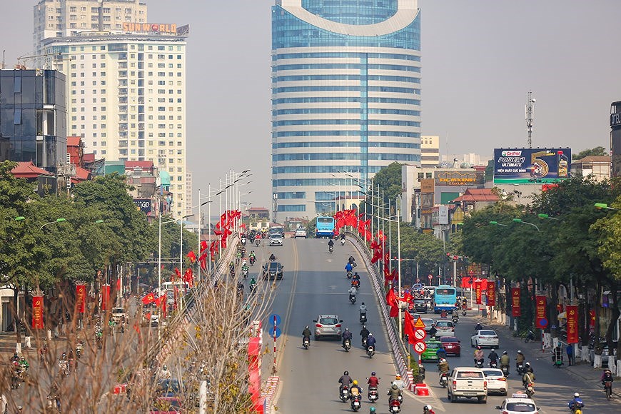 Hanoi given new facelift to welcome 13th National Party Congress hinh anh 16