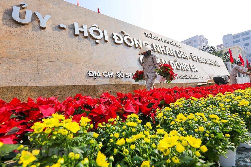 Hanoi given new facelift to welcome 13th National Party Congress hinh anh 21