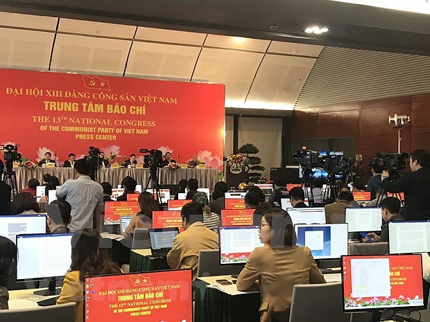 More than 200 media outlets to cover 13th National Party Congress at the scene hinh anh 6