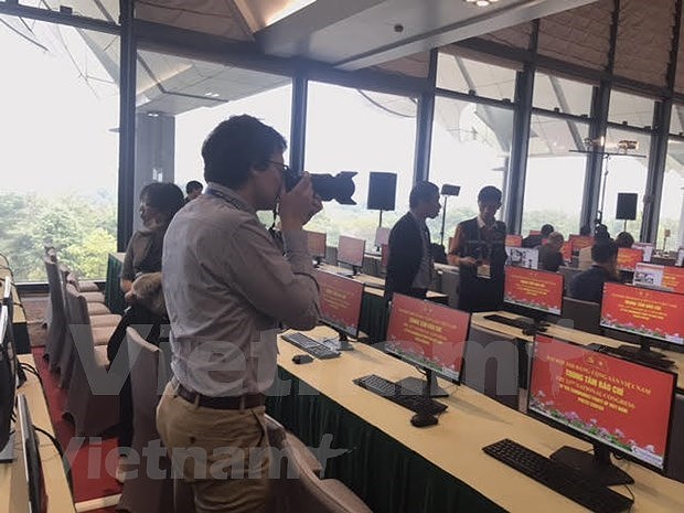 More than 200 media outlets to cover 13th National Party Congress at the scene hinh anh 5