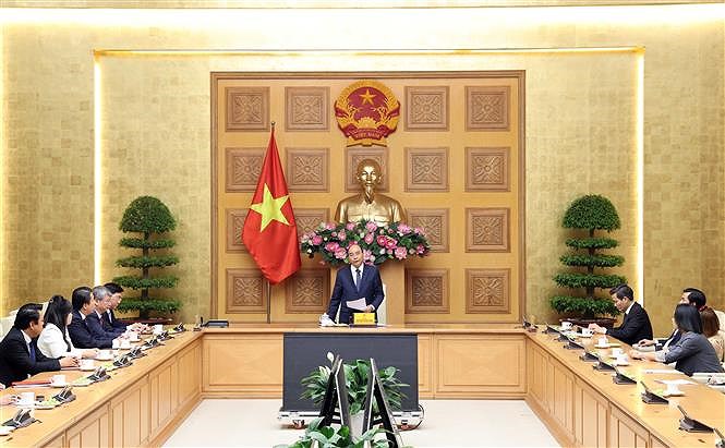 PM hosts Vietnam-ASEAN Economic Cooperation Development Association delegation hinh anh 1