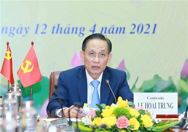 Teleconference informs outcomes of 13th CPV Congress to Chinese party hinh anh 1