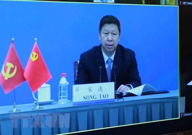 Teleconference informs outcomes of 13th CPV Congress to Chinese party hinh anh 2
