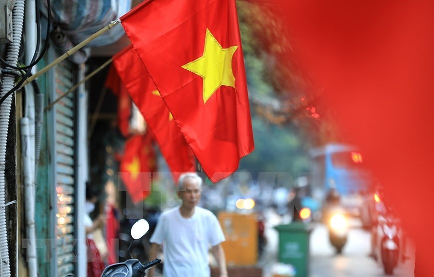 Hanoi streets colourful to celebrate National Day hinh anh 1