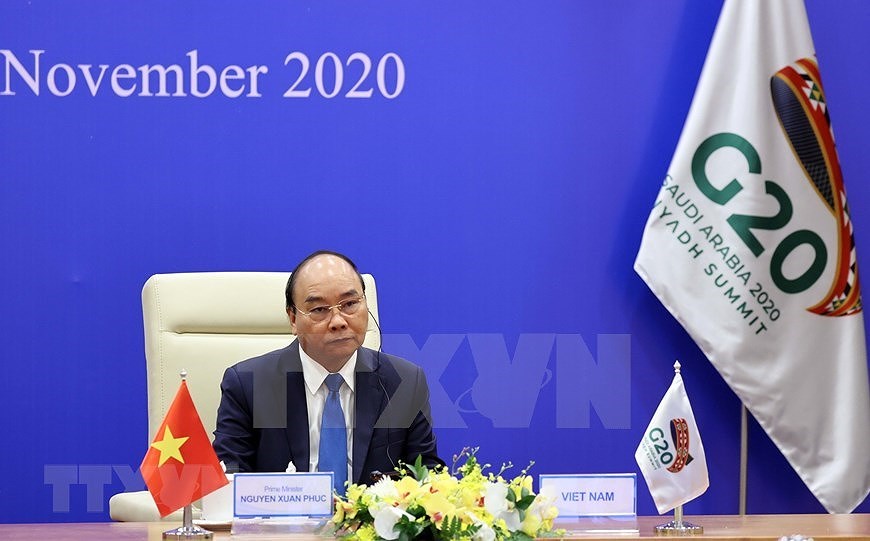Le Premier ministre Nguyen Xuan Phuc assiste au Sommet virtuel du G20 hinh anh 1