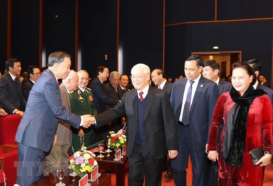 Meeting en l’honneur du 90e anniversaire du Parti communiste du Vietnam hinh anh 5