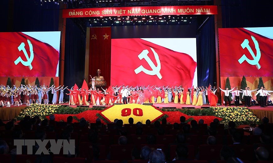 Meeting en l’honneur du 90e anniversaire du Parti communiste du Vietnam hinh anh 9