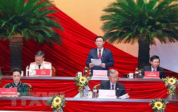Продолжаются обсуждения проектов документов, представленных на XIII всевьетнамскии съезд партии hinh anh 1