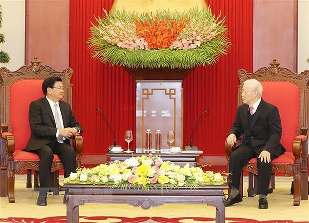 Развивать и впредь отношения солидарности между Вьетнамом и Лаосом hinh anh 1