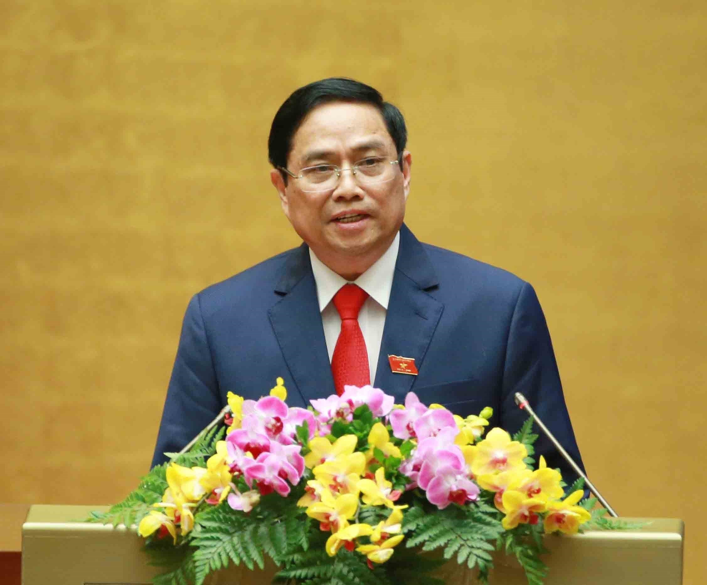 11-ая сессия Национального собрания 14-го созыва: Фам Минь Тьинь избран премьер-министром Вьетнама hinh anh 1