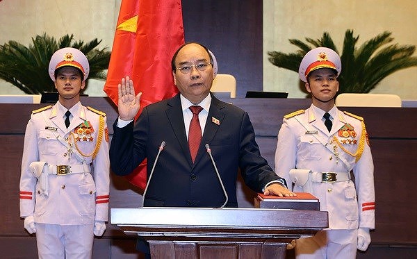 Президент страны Нгуен Суан Фук: продолжать совершать подвиги, превращая Вьетнам в богатую и сильную страну hinh anh 1