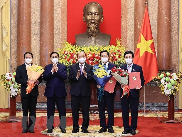 Президент государства Нгуен Суан Фук принял решение о назначении членов правительства на срок 2021-2026 гг. hinh anh 1