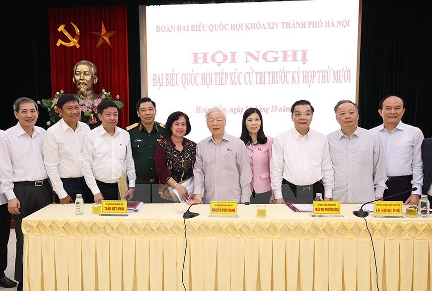 Генеральныи секретарь ЦК КПВ, президент Вьетнама встретился с избирателями Ханоя hinh anh 11