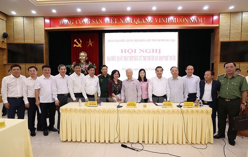 Генеральныи секретарь ЦК КПВ, президент Вьетнама встретился с избирателями Ханоя hinh anh 12