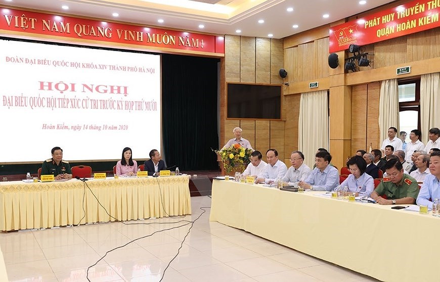 Генеральныи секретарь ЦК КПВ, президент Вьетнама встретился с избирателями Ханоя hinh anh 5