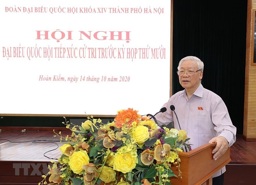 Генеральныи секретарь ЦК КПВ, президент Вьетнама встретился с избирателями Ханоя hinh anh 6