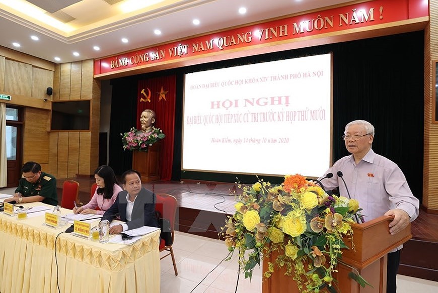 Генеральныи секретарь ЦК КПВ, президент Вьетнама встретился с избирателями Ханоя hinh anh 7