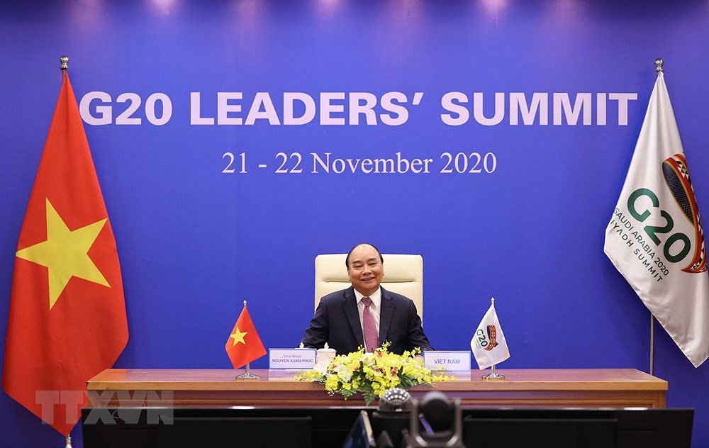 组图：政府总理阮春福出席二十国集团领导人峰会第二阶段会议 hinh anh 1