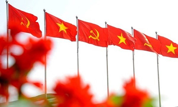 老挝人民革命党高度评价越南共产党所取得的成就 hinh anh 1
