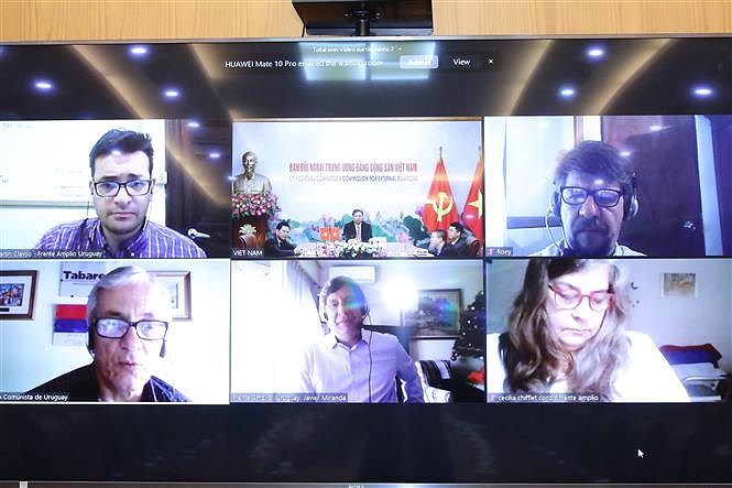 越共中央对外部领导与乌拉圭政党领导举行视频会谈 hinh anh 2