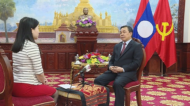 老挝驻越大使高度评价越共十三大的筹备工作 hinh anh 2