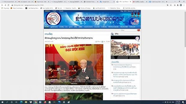 老挝媒体深度报道越共十三大开幕式 hinh anh 1