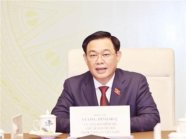 越南国会主席王廷惠与老挝国会主席赛宋蓬·丰威汉通电话 hinh anh 1