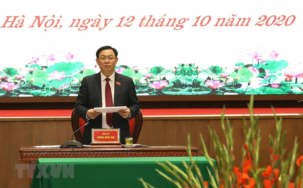 组图：王廷惠同志再次当选2020-2025年任期河内市市委书记 hinh anh 1