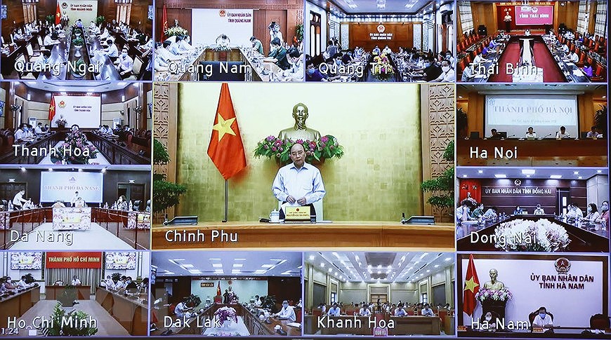 组图：政府总理举行全国抗击新冠肺炎疫情视频会议 hinh anh 2