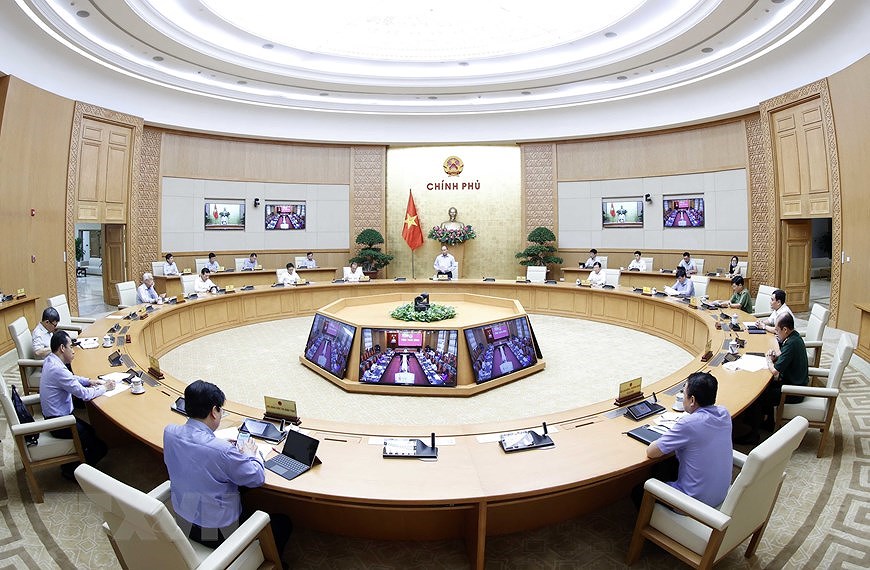 组图：政府总理举行全国抗击新冠肺炎疫情视频会议 hinh anh 3