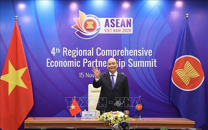 组图：阮春福总理主持第4次区域全面经济伙伴关系协定领导人会议 hinh anh 2