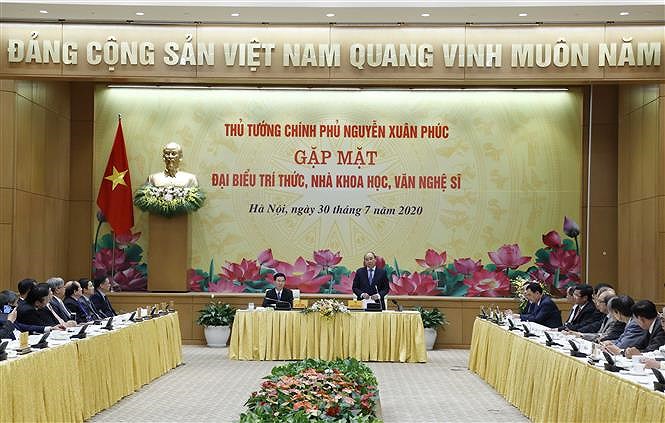 PM pledges favourable conditions for development of intellectuals hinh anh 1