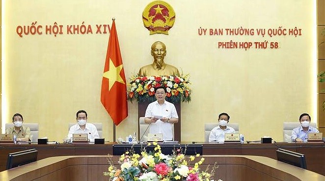 NA Standing Committee wraps up 58th meeting hinh anh 1