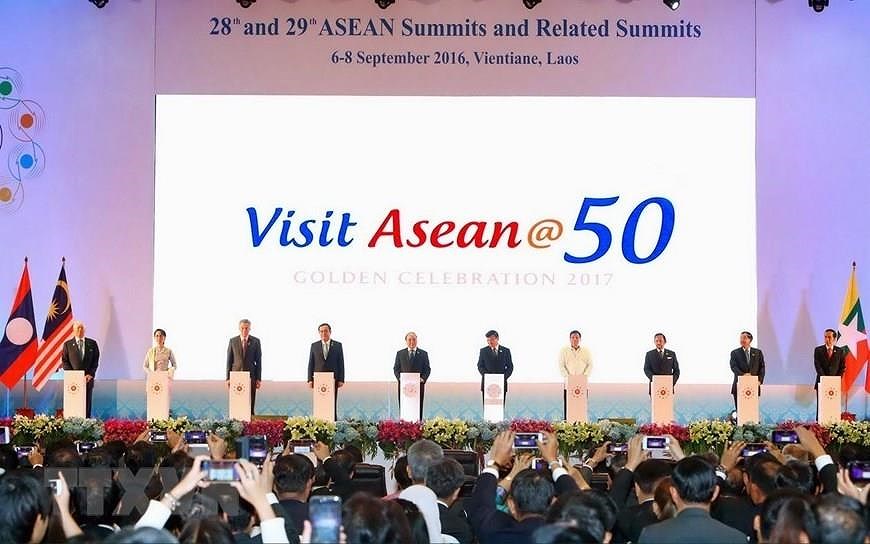 [Fotos] Vietnam, miembro activo y proactivo de ASEAN hinh anh 12