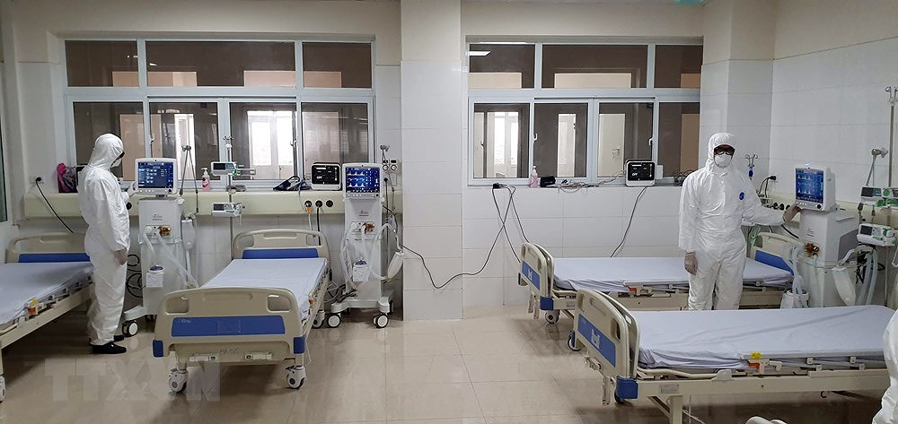 [Foto] En funcion hospital para poner en cuarentena sospechosos del nCoV hinh anh 5