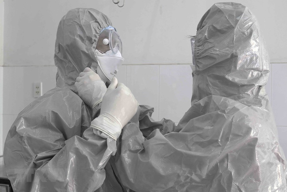 [Foto] Vietnam se esfuerza por controlar el contagio del coronavirus hinh anh 1