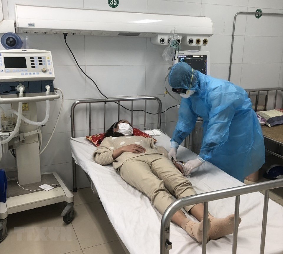 [Foto] Vietnam se esfuerza por controlar el contagio del coronavirus hinh anh 12