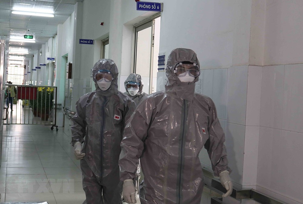 [Foto] Vietnam se esfuerza por controlar el contagio del coronavirus hinh anh 2