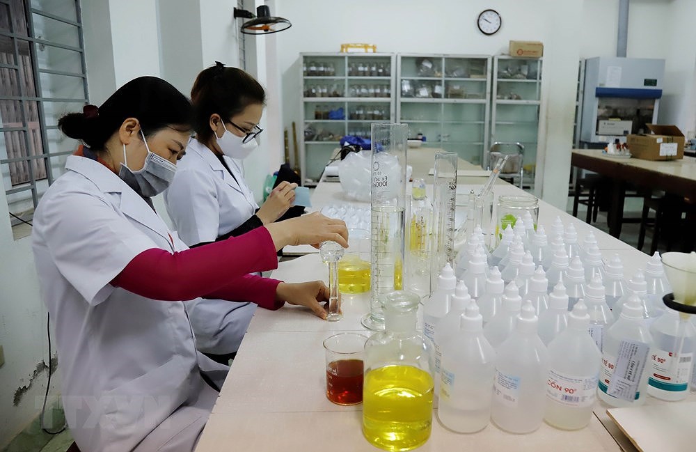 [Foto] Vietnam se esfuerza por controlar el contagio del coronavirus hinh anh 6