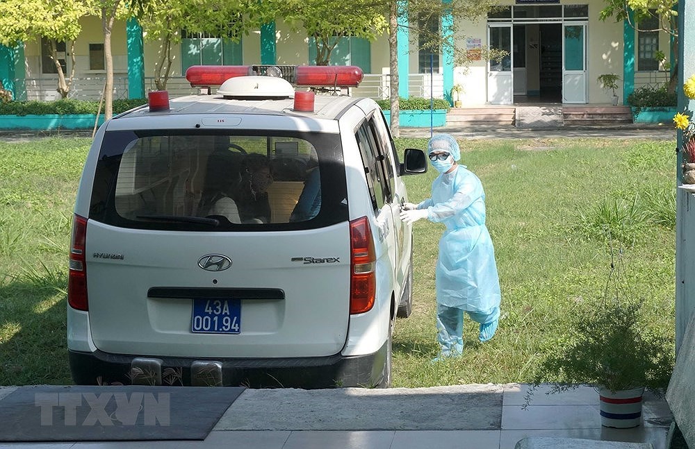 [Foto] Vietnam se esfuerza por controlar el contagio del coronavirus hinh anh 7