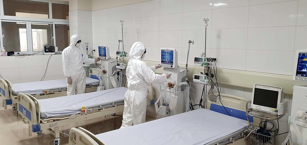 [Foto] Vietnam se esfuerza por controlar el contagio del coronavirus hinh anh 9