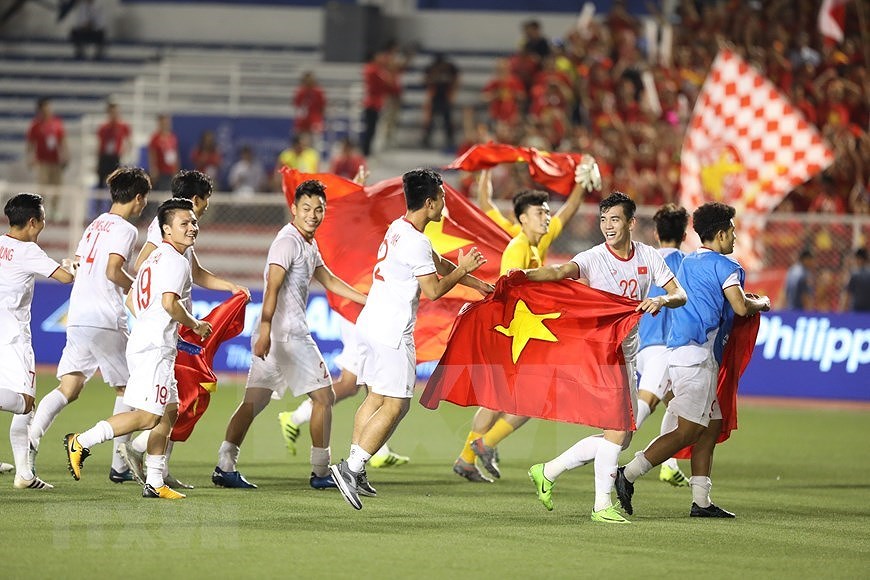[Fotos] Sueno cumplido: Vietnam se proclama por primera vez campeon de SEA Games hinh anh 1