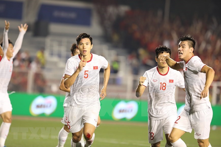 [Fotos] Sueno cumplido: Vietnam se proclama por primera vez campeon de SEA Games hinh anh 11