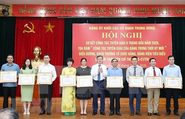 Analizan labores de propaganda partidista de los organos centrales de Vietnam hinh anh 1