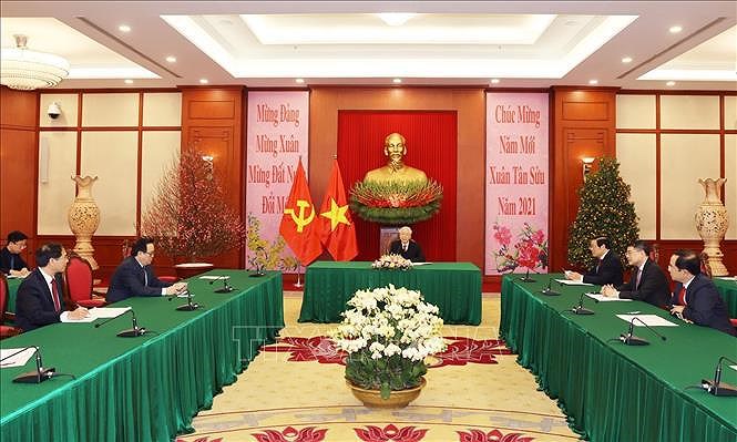 Maximos dirigentes partidistas de Vietnam y Cuba aprecian amistad binacional hinh anh 1