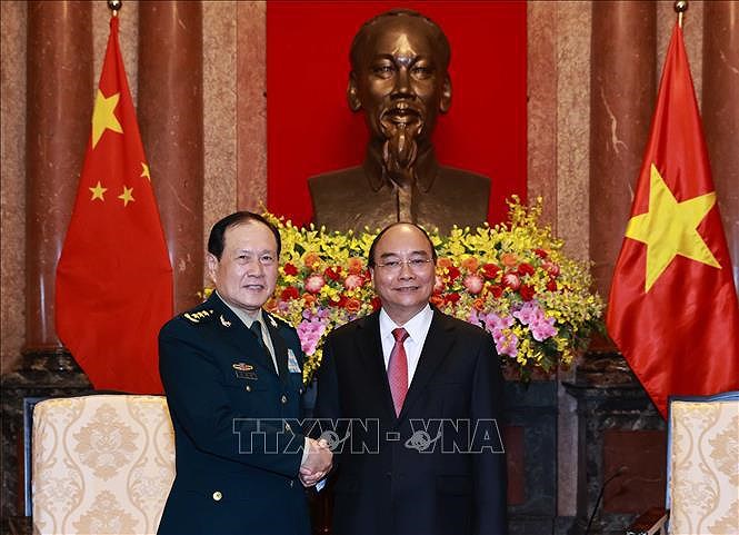Vietnam concede gran importancia al fomento de nexos con China hinh anh 2