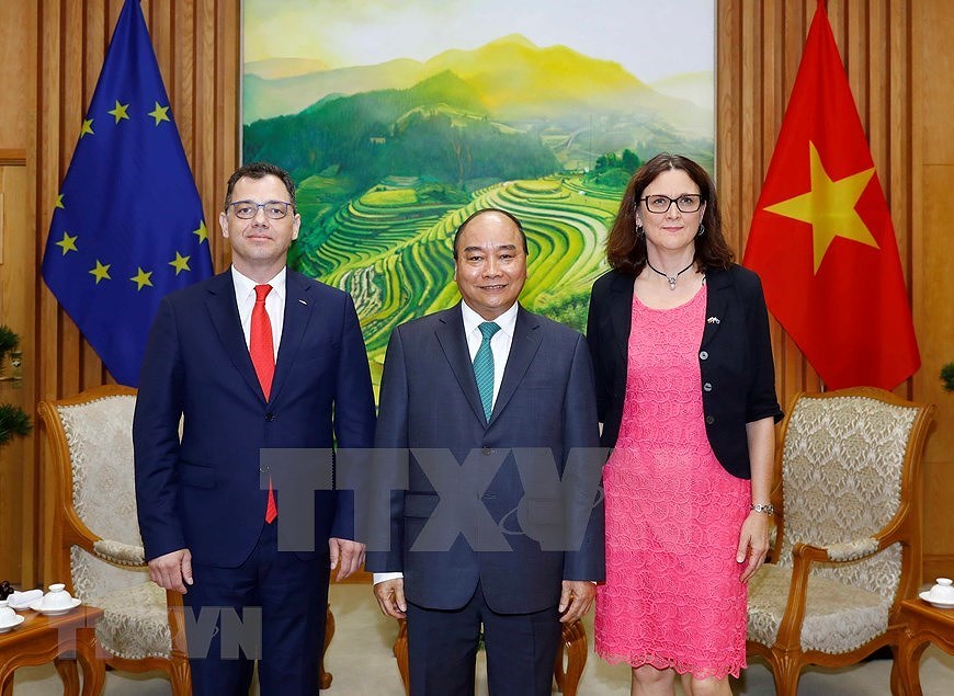 [Fotos] Firman Acuerdos de Libre Comercio y de Proteccion de la Inversion entre Vietnam y UE hinh anh 10