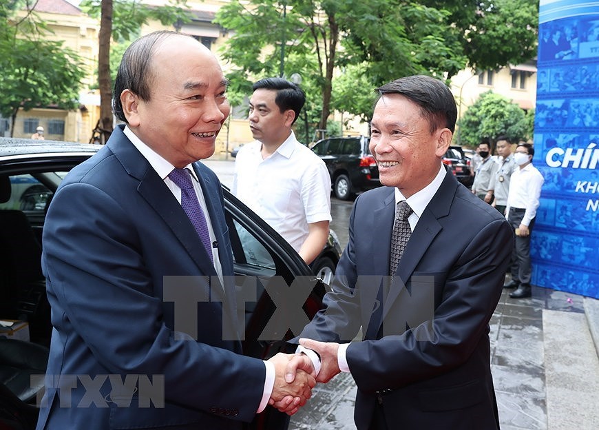 Primer ministro de Vietnam asiste al acto conmemorativo del aniversario 75 de la fundacion de la VNA hinh anh 1