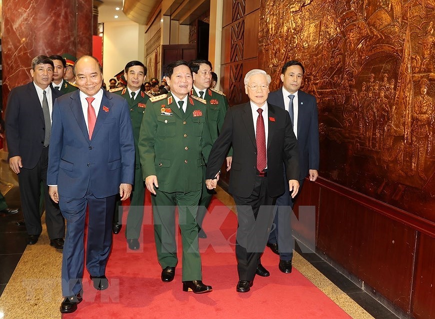 Secretario general del Partido Comunista y presidente de Vietnam participa en la XI Asamblea partidista del Comite partidita del Ejercito hinh anh 1